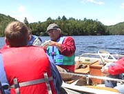 Army Corps Visit July 01 2 Bob explains how to check for bio activity on milfoil.jpg